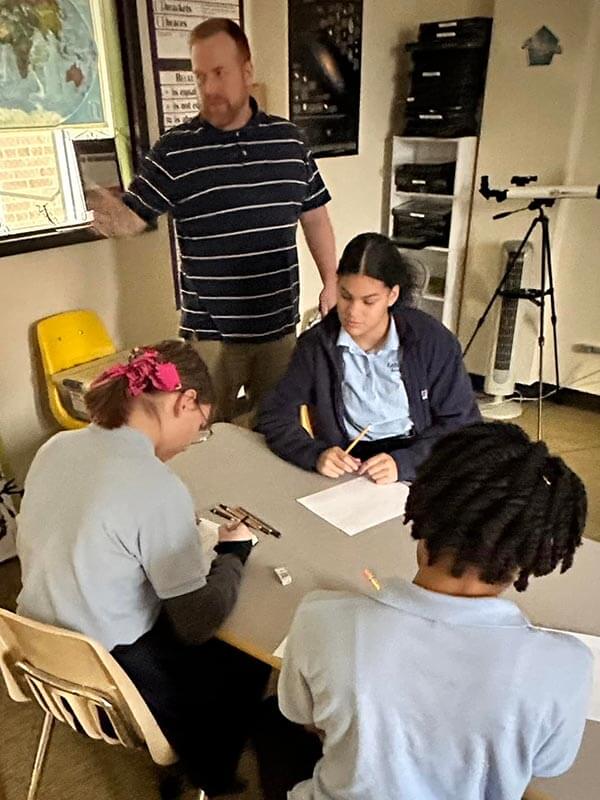 A Lahr-Well instructor teaches a class of students at the Academy.